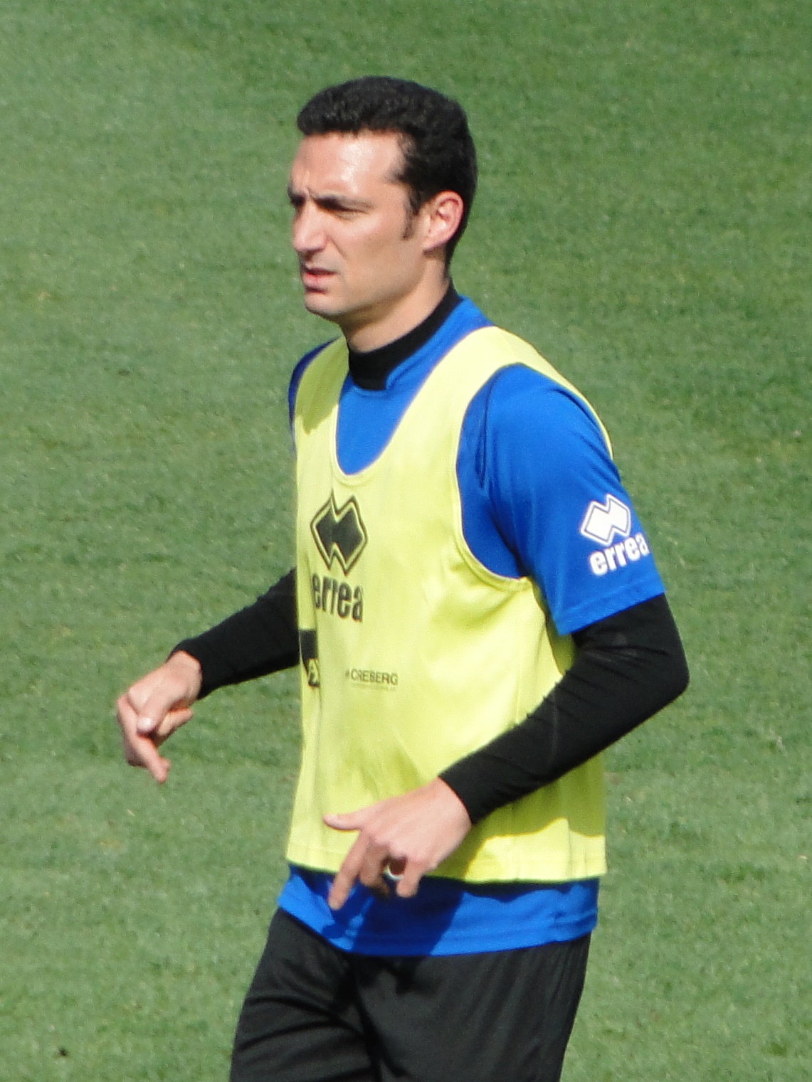 Lionel Scaloni — DT campeón del mundo; alterna 4-4-2 y 4-3-3 alrededor de Messi.