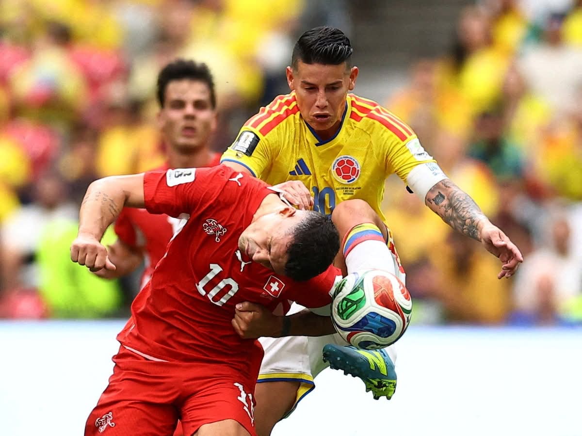 Swiss grit: fighting for every ball to hold the 0-0 against James's Colombia.